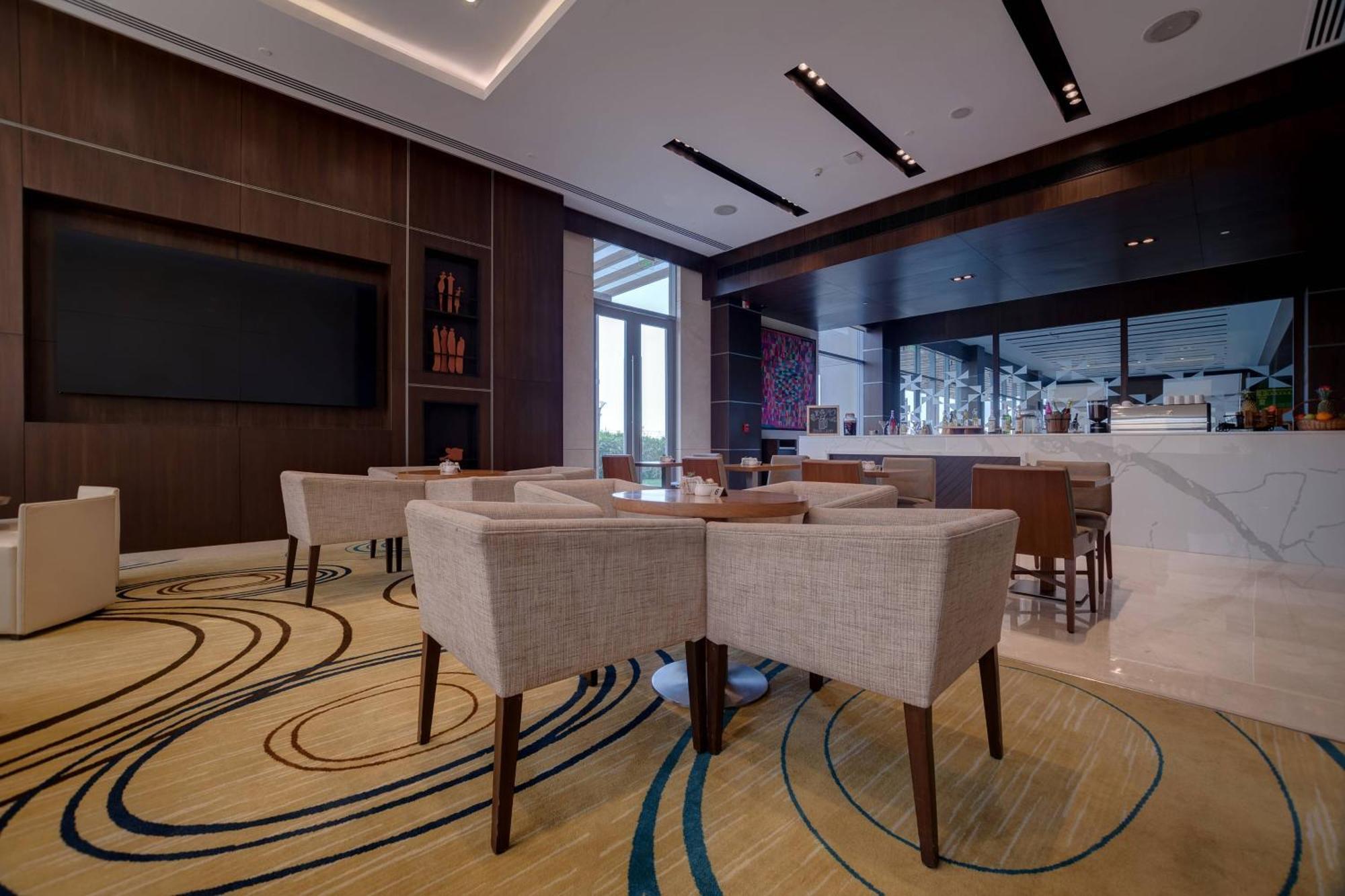 Hotel Courtyard By Marriott Surate Extérieur photo
